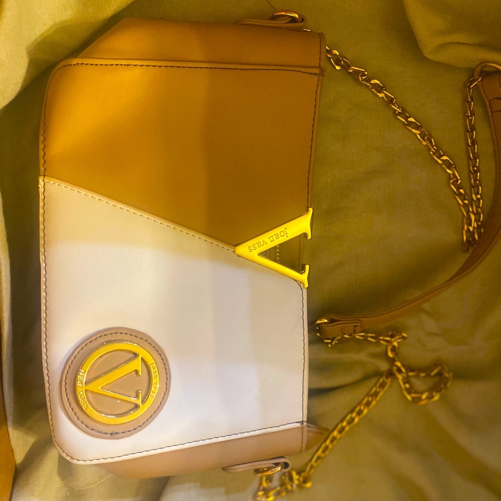 Beautiful beige and white purse. Brand Joan Vass.